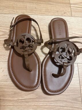 Coach Logo Jaci Brown Leather Thong Sandals with Ankle Strap and Gold Buckle